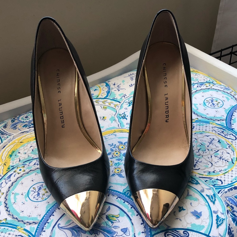 SOLD: Chinese Laundry black pumps with gold toe